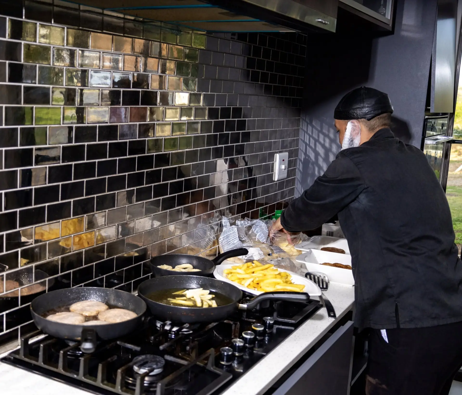 Chef preparing breakfast in the modern farm kitchen